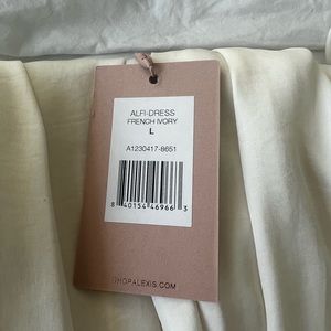 Alexis cream dress new with tags